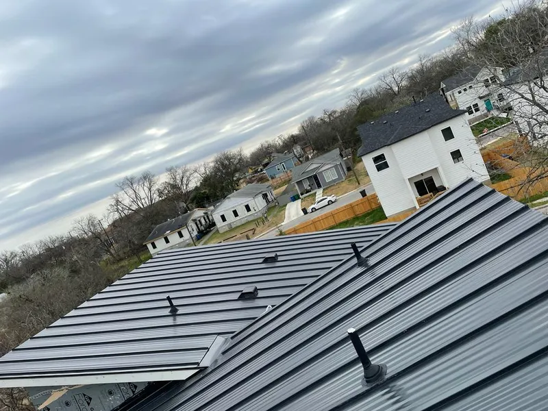 Standing seam metal roof panels with vents for Skylight Repair in West Fargo